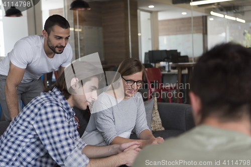 Image of team meeting and brainstorming