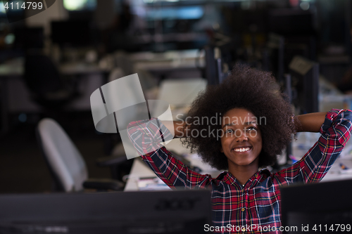 Image of young black woman at her workplace in modern office  African-Ame