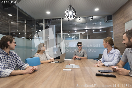 Image of startup business team on meeting at modern office