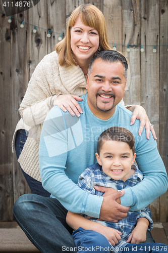 Image of Young Mixed Race Family Portrait Outside