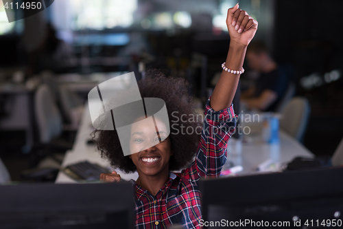 Image of young black woman at her workplace in modern office  African-Ame