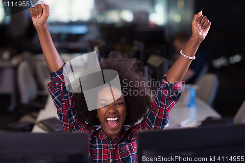 Image of young black woman at her workplace in modern office  African-Ame