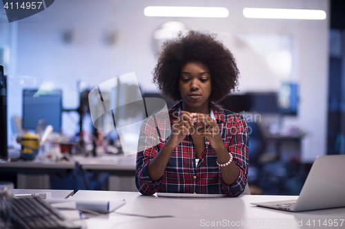Image of young black woman at her workplace in modern office  African-Ame