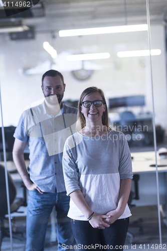 Image of business couple at office