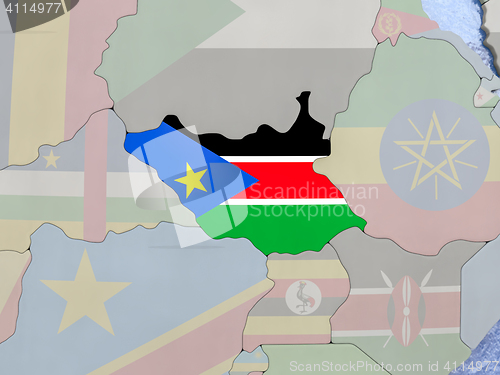 Image of South Sudan with flag on globe