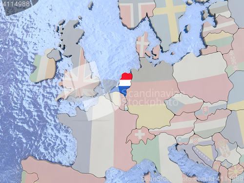 Image of Netherlands with flag on globe