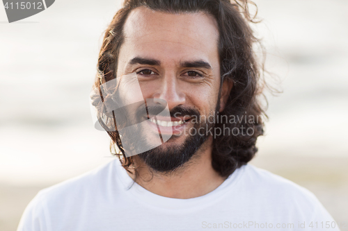 Image of close up of happy smiling middle aged man face