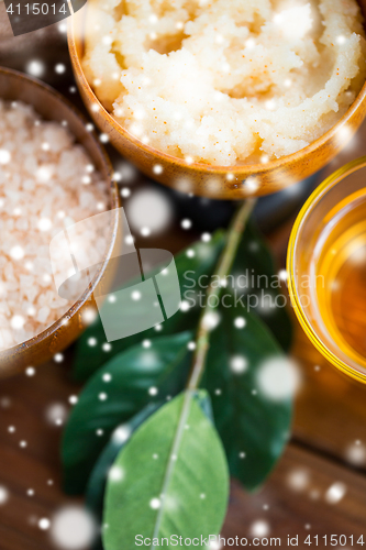 Image of close up of body scrub in wooden bowl