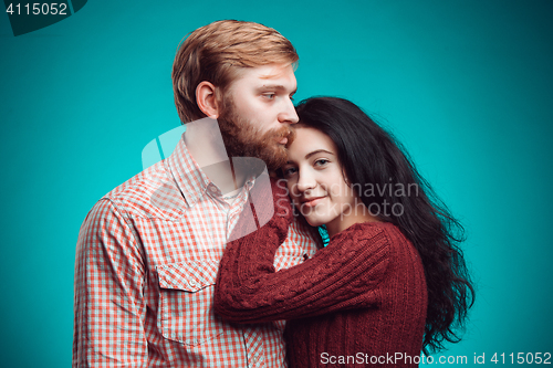 Image of The embrace of young man and woman