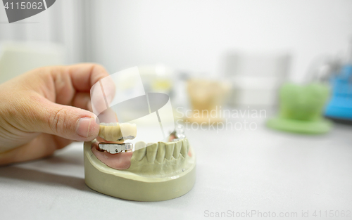 Image of Dental technician  in dental laboratory