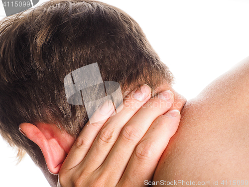 Image of Unrecognizable man holding hand against neck, in pain, isolated 