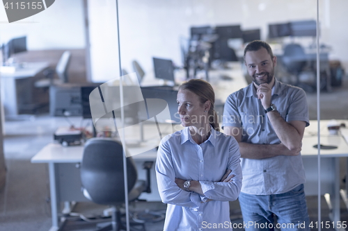 Image of business couple at office