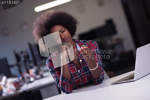 Image of young black woman at her workplace in modern office  African-Ame