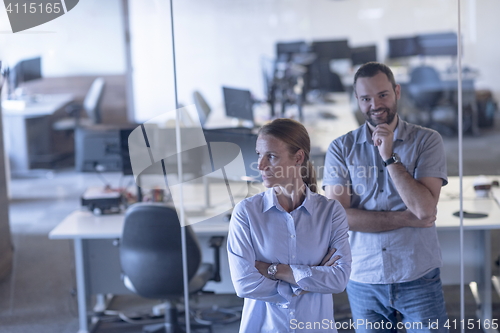 Image of business couple at office