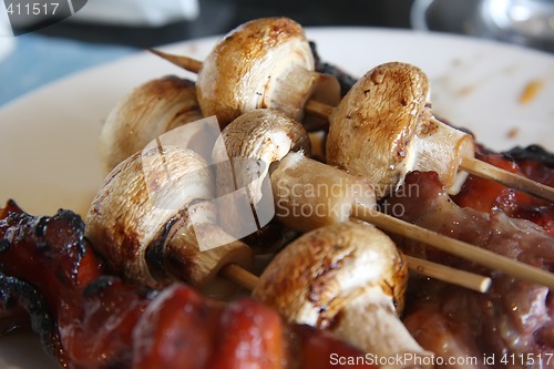 Image of Grilled meat and mushrooms