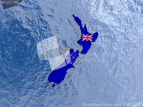 Image of New Zealand with flag on globe