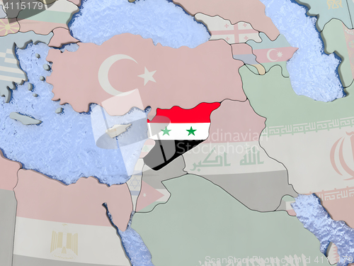 Image of Syria with flag on globe