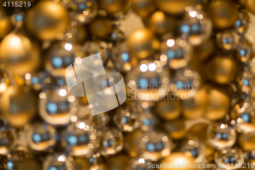 Image of golden christmas decoration or garland of beads