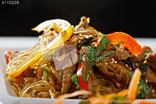 Image of Glass rice noodles served with beef closeup