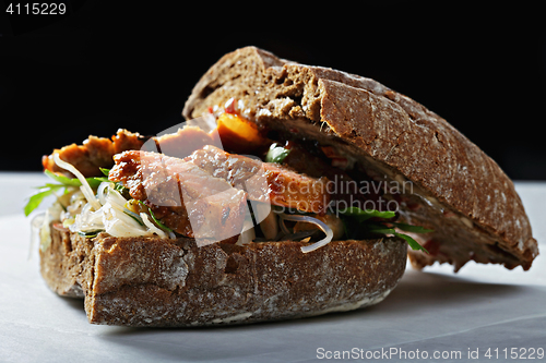 Image of Beef sandwich with kimchi closeup