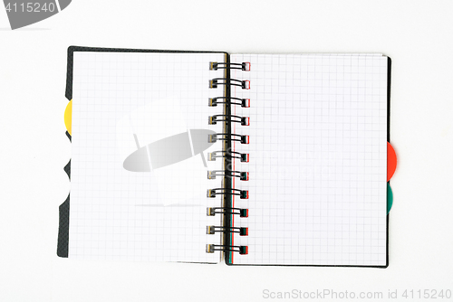 Image of notepad with pen isolated