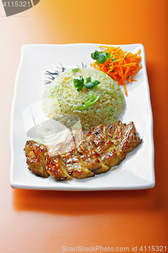 Image of Grilled pork with rice and vegetables