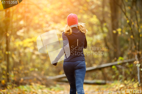 Image of Pretty girl running in morning