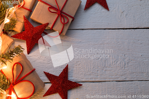 Image of Presents in cartons, red stars