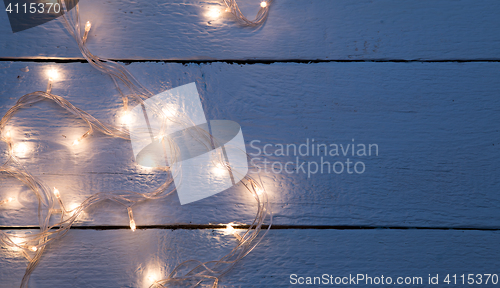 Image of Festoon on empty wooden floor