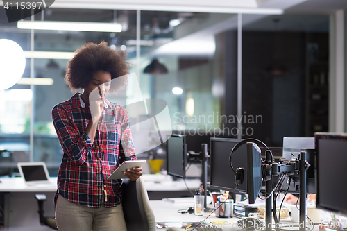 Image of young black woman at her workplace in modern office  African-Ame