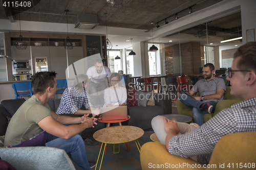 Image of team meeting and brainstorming