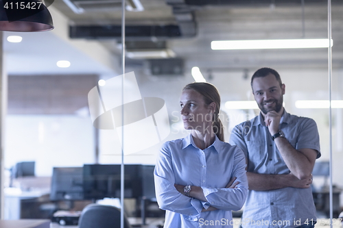 Image of business couple at office