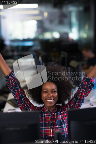 Image of young black woman at her workplace in modern office  African-Ame