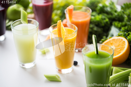 Image of glasses with different fruit or vegetable juices