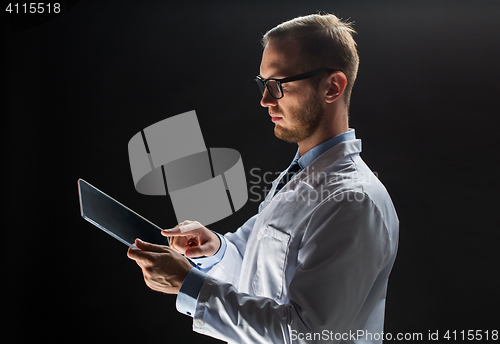 Image of close up of doctor or scientist with tablet pc