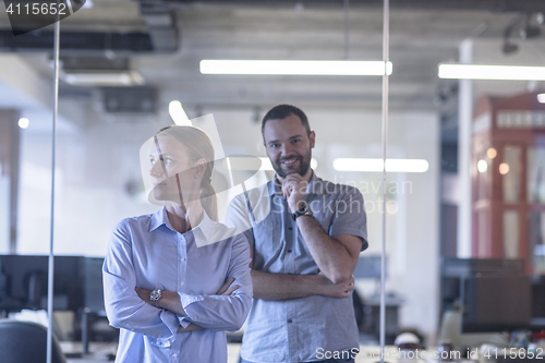 Image of business couple at office