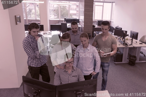 Image of startup business people group working as team to find solution