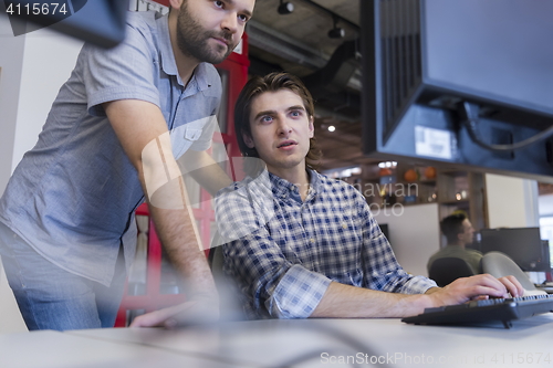 Image of startup business people group working as team to find solution