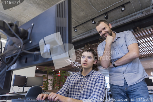 Image of startup business people group working as team to find solution