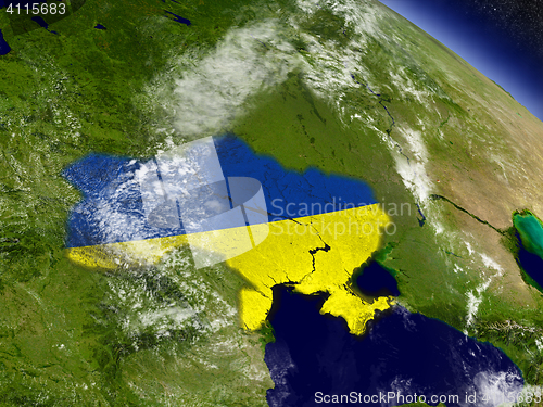 Image of Ukraine with embedded flag on Earth