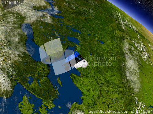 Image of Estonia with embedded flag on Earth