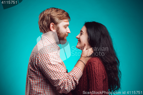 Image of The embrace of young man and woman