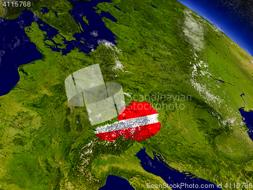 Image of Austria with embedded flag on Earth