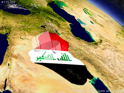 Image of Iraq with embedded flag on Earth