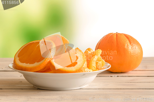 Image of Orange fruits in a bowl