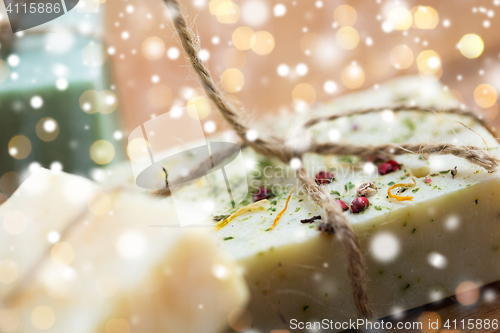 Image of close up of handmade soap bars on wood