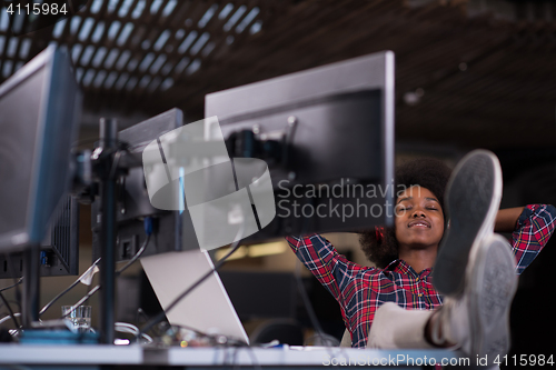 Image of portrait of a young successful African-American woman in modern 