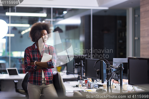 Image of young black woman at her workplace in modern office  African-Ame