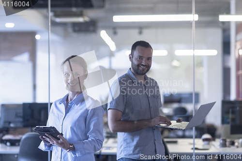 Image of business couple at office