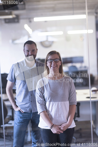 Image of business couple at office